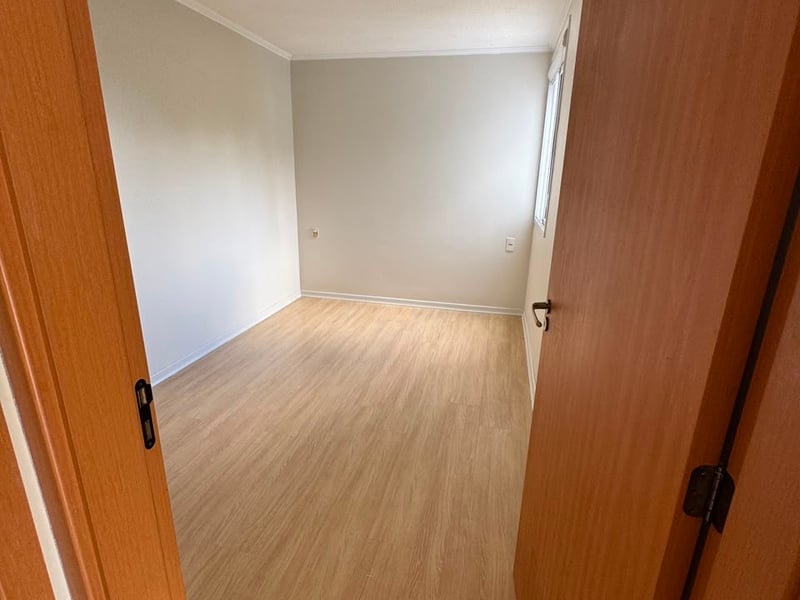 Quarto com piso amadeirado